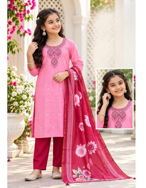 Load image into Gallery viewer, A young girl modeling a pink ethnic salwar kameez set with a matching floral dupatta, featuring an inset image showing a close-up of the embroidered neckline.
