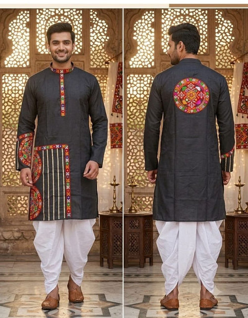 Load image into Gallery viewer, A man modeling a dark charcoal gray kurta from the front and back, paired with white dhoti pants and brown leather shoes. The kurta features colorful embroidered details on the neckline, cuffs, and a large circular mandarin-pull back design.
