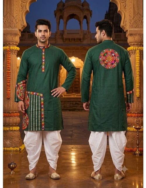 Load image into Gallery viewer, A man modeling a dark green traditional Indian kurta with colorful embroidery, paired with white dhoti pants, shown from both front and back views against an ornate architectural backdrop.
