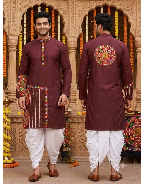 Load image into Gallery viewer, A man modeling a traditional maroon kurta with colorful embroidery, shown from both front and back views, paired with white dhoti pants and brown shoes in front of an ornate stone archway decorated with marigold garlands.
