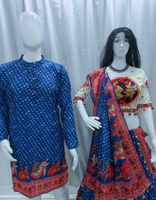 Load image into Gallery viewer, Two mannequins display traditional Indian ethnic wear against a white curtain backdrop. The left mannequin wears a blue kurta with small white motifs and a red border print.
