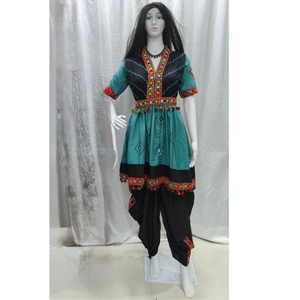 A women's traditional Navratri Dandiya outfit displayed on a mannequin, featuring a teal and black kurta with colorful geometric embroidery and a matching waist tie, paired with black patagonia-style pants with embroidered details.
