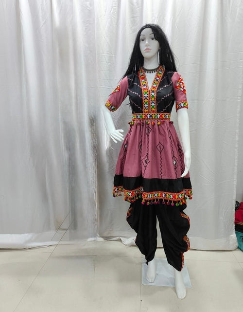 Load image into Gallery viewer, A traditional women's Navratri Garba outfit displayed on a mannequin, featuring a dusty pink kurta with black and multicolor geometric embroidery, paired with black pants.
